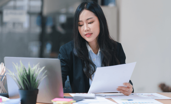 Certified translator working on translating legal documents for a Virginia client using certified translation services.