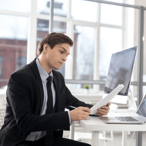 Certified translator in Virginia, working on a certificate of accuracy with the translation, ensuring it meets requirements.