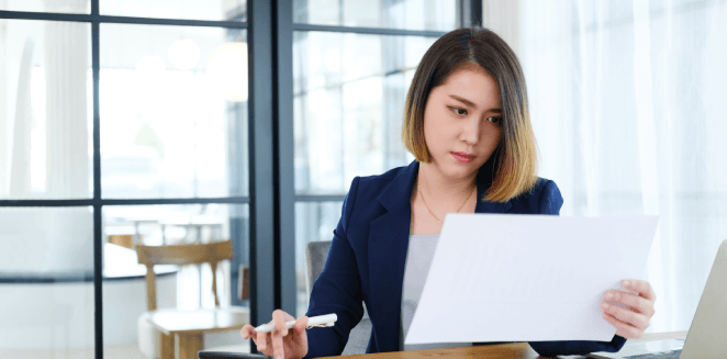 A translator providing immigration docs for USCIS submission, ensuring compliance with Virginia’s legal translation standard.